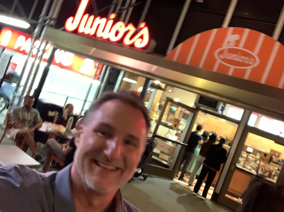 Mike Millett outside Junior's in New York